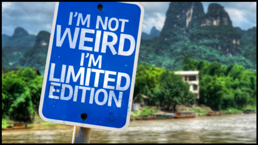 Blue signpost with white writing that reads I'm not weird, I'm limited edition.