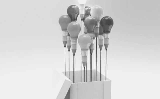Featured Images - A cluster of lightbulbs that turn into pencils at the narrow end. They all have strings attached and are coming out of a box like balloons. Image bought from DepositPhotos