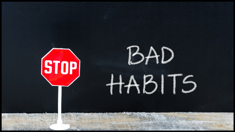 Photo of a black background with the words Bad Habits written in white. Beside it, it a red hexagonal stop sign