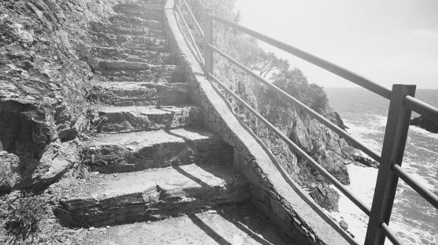 Featured Images - 20 step Process for writing your novel. Photo of stone steps overlooking the sea. Image from GraphicStock