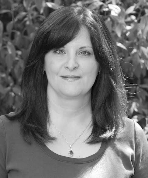 Black and white headshot of author Jayne Denker