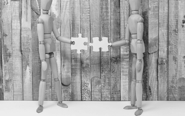 Featured Images - Photo of two artist dummies holding jigsaw pieces that connect. Image from Pixabay