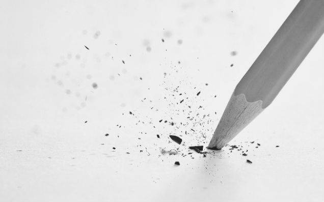 Featured Images - close up photo of a pencil on paper, with the lead snapped. Image from GraphicStock