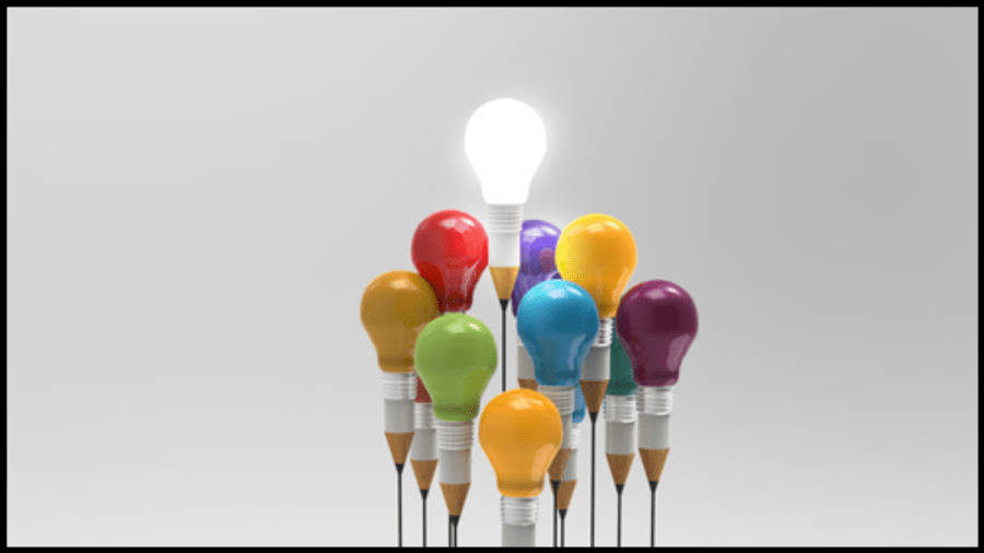Image of multiple colourful lightbulbs floating like balloons. One is lit and higher than the others.