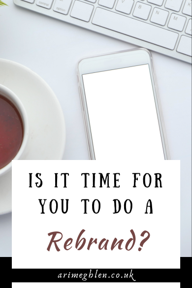 Image of laptop, phone and cup of tea flaylat. Text overlay reads: Is it time for you to do a rebrand?