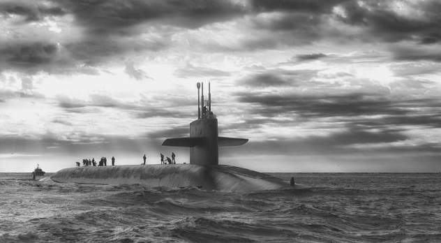 Featured Image - Submarine above the water with men on top. Image from Pixabay