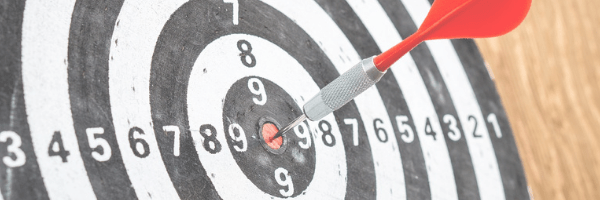 Image: Target with dart in the bullseye