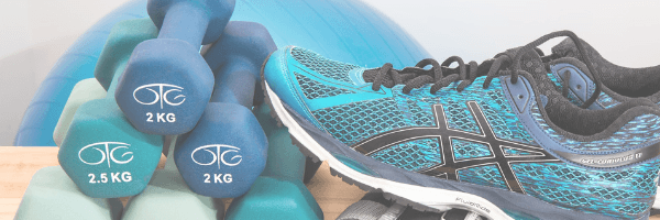 Image of dumbbels and running shoes to symbolise health