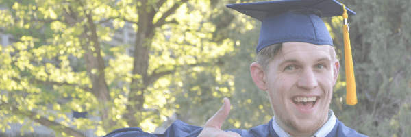 Smiling graduate student. Pixabay