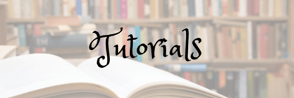 Tutorials page banner. Image of library and an open book. Image from Pixabay