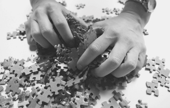 Featured-Images- hands grabbing at jigsaw pieces. Image from Pixabay
