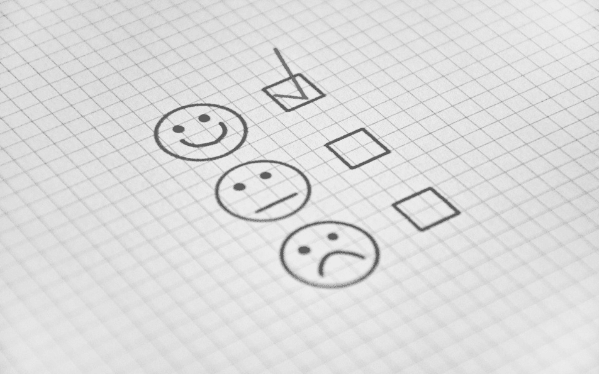 Featured-Images--Smiley face, neutral face, sad face. Tick next to the smiley face. Image from Pixabay