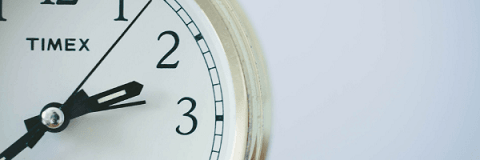 Image of a close up of part of a clock face.  Image from Pixabay