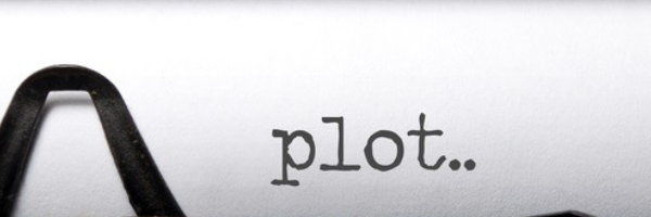 Typewriter with the word Plot typed out