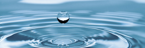 Image close up of a dropley of water falling towards a body of water, showing the ripples from previous drops.  Image from Pixabay