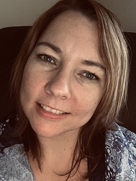 Headshot of author Reign Atkins