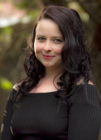 Headshot phot of author Renee April