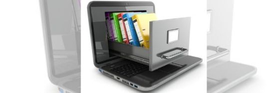 Image of a laptop with the screen sliding out like a file cabinet drawer and the drawer full of coloured binders. Image from DepositPhotos