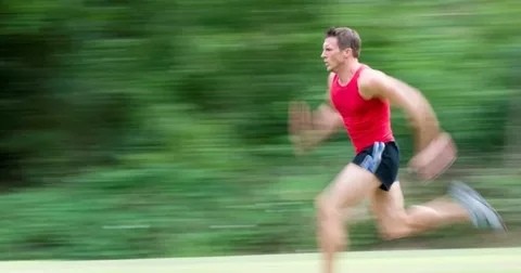 Blurred image of a man running fast