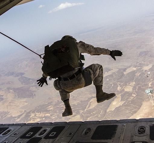 Photo of an serviceman jumping out of a plane in a skydive. Image from Pixabay by Skeeze