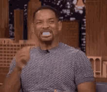 Gif of Will Smith, biting his nails nervously then clapping. Feeling excited gif from tenor