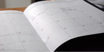 Calendar diary opened on a desk. Image from Pixabay