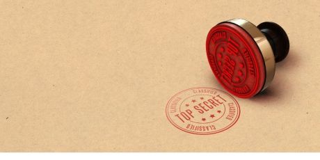 A top secret stamp in red.  Image from Canva