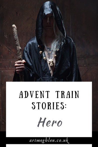 Advent Train Stories: Hero. Image of a man in hooded cloak, with a staff.