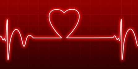 Image is of a heartbeat monitor but along with the pulse blips, there is a heart in the image