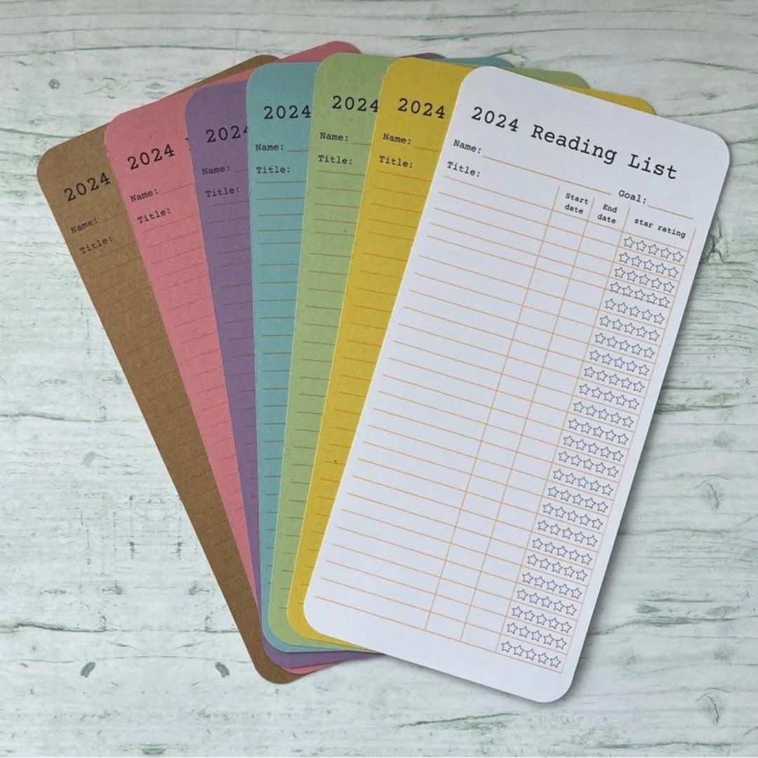 Reading list bookmark, looks like library cards, with a section for title, stard and end date and star rating. Available at EmmasCreativeNook on Etsy