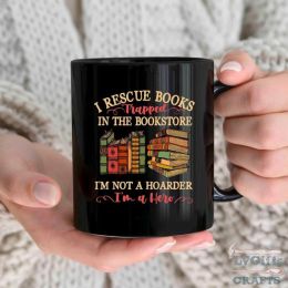 Mug with the words I rescue books trapped in the bookstore, I'm not a hoarder, I'm a hero.