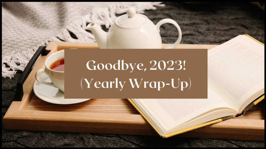 Photo of teacup and teapot on a tray laying on blanket. Text overlay reads Goodbye, 2023! (Yearly wrap-up)