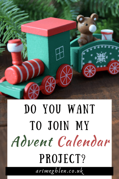 Photo of a green and red wooden Christmas Train with the text overlay reading: Do You Want To Join My Advent Calendar Project? AriMeghlen.co.uk